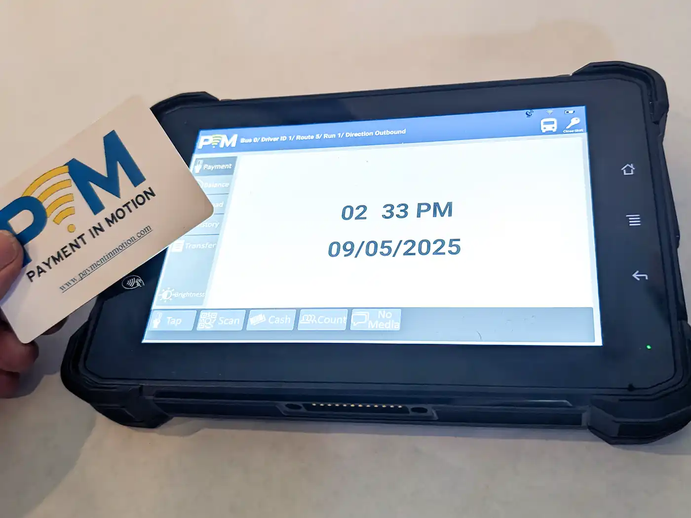 Man Using Measuring Tape in Factory Setting Man Using Measuring Tape in Factory Setting